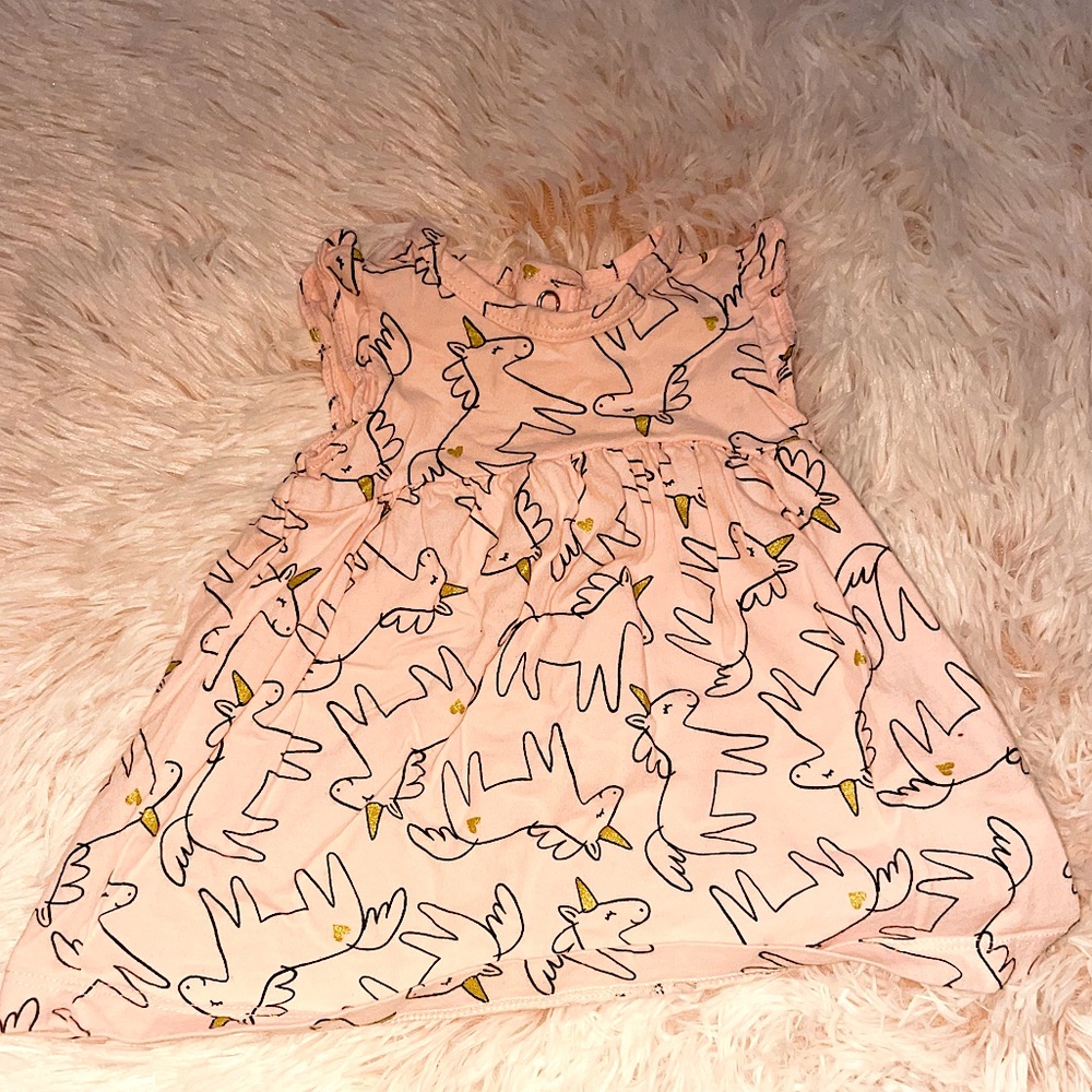 Pink baby girls unicorn dress.